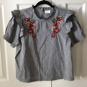 Black and White Blouse with Floral Detail